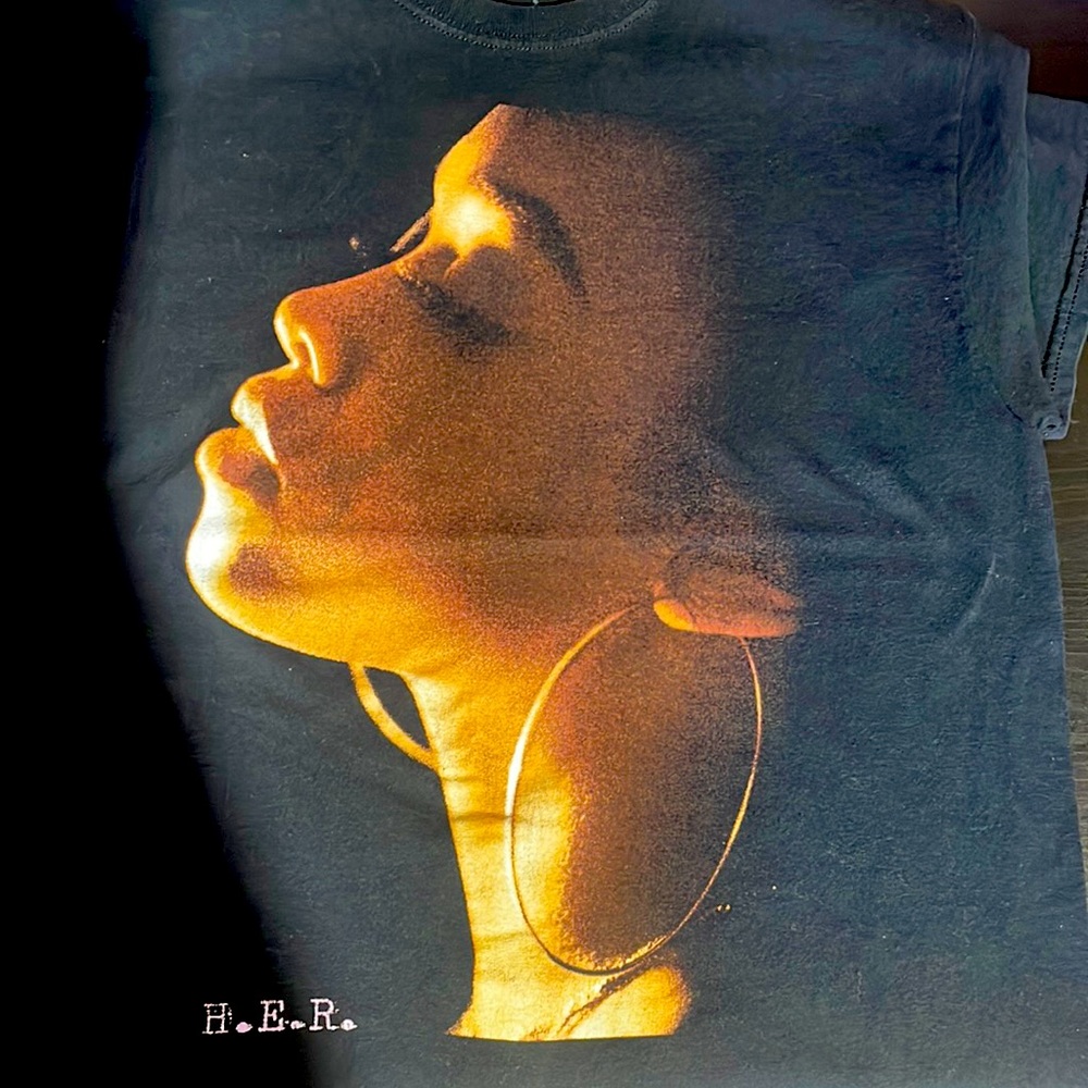 HER TEE
